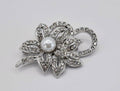 Vintage zilverkleurige broche met strass